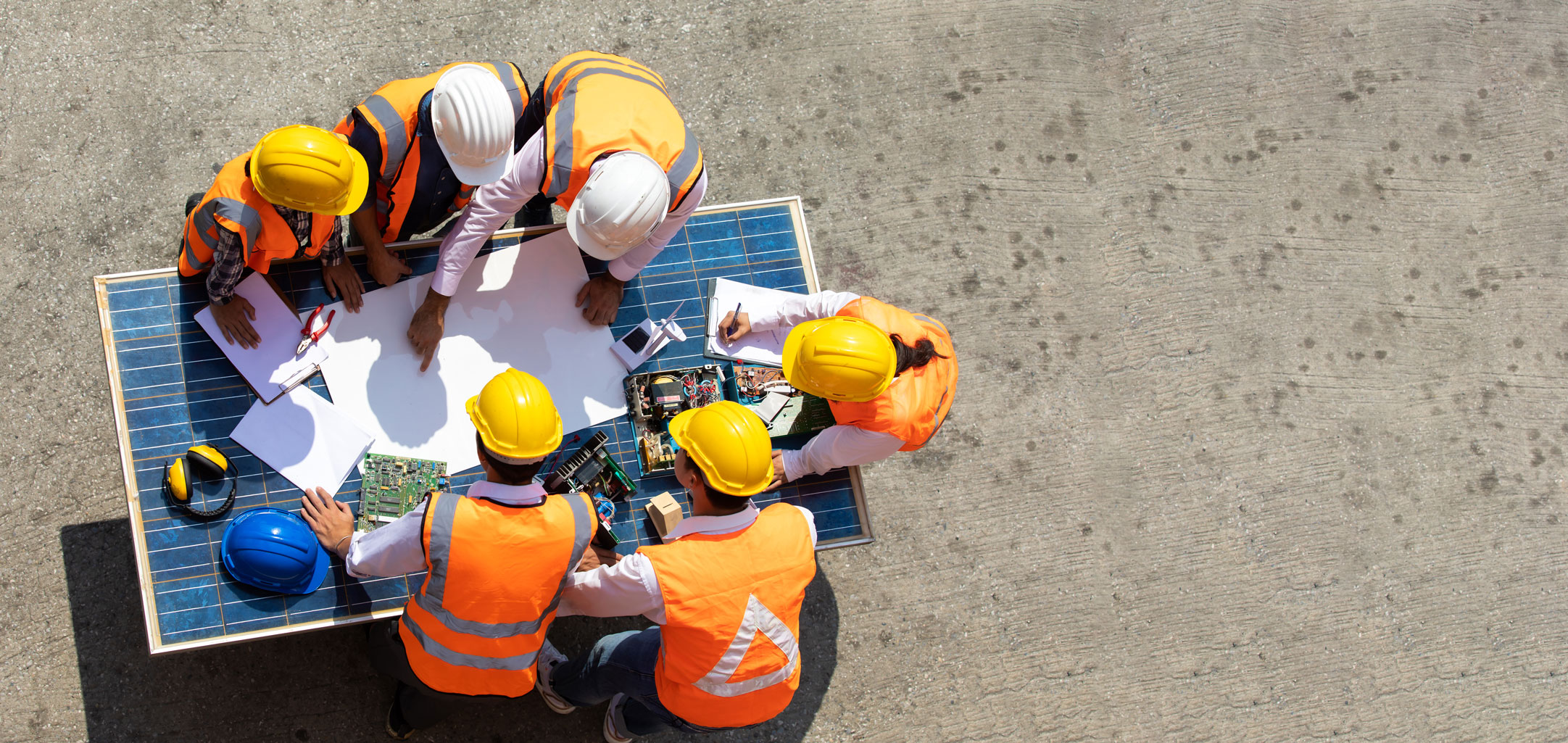 encore safety group construction crew huddling around safety plan